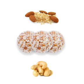Almond and cashew Dates protein ball by Kingdom Dates UAE, showing a close-up of the nut-filled snack with textured surface.