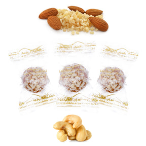 Almond-wrapped Dates Protein Ball with cashew from Kingdom Dates UAE, showing a chewy date snack coated with almonds.