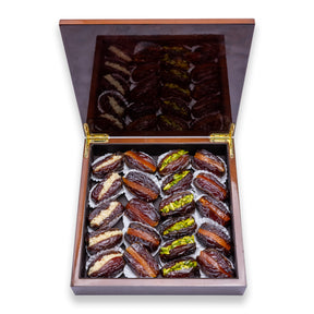 Majdoul dates filled with nuts in a rosewood sunset wooden box, showcasing the rich, brown dates and elegant packaging.