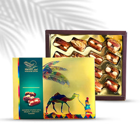 Gift boxes of dates stuffed with walnuts and hazelnuts from Kingdom Dates UAE, showing assorted nut-filled date treats.