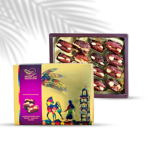 Gift box of dates stuffed with hazelnuts and walnuts, 250g, from Kingdom Dates UAE, showing the assorted nut-filled dates in packaging.