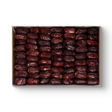 Khedri dates in a 3kg box from Kingdom Dates UAE, showcasing fresh, plump dates with textured brown skin.