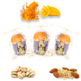 Luxury Khedri Dates Stuffed with Nuts & Half-Dipped in Mango Chocolate (Wrapped)