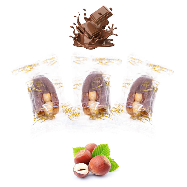 Individually wrapped milk chocolate dates stuffed with hazelnuts, dried fruits, and nuts from Kingdom Dates UAE.