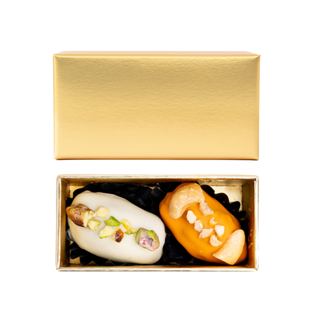 Golden Choco Gift box featuring full-coated nuts dates by Kingdom Dates, with two premium dates inside, in a decorative package.